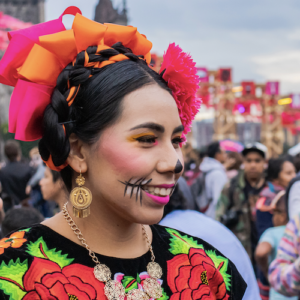 Use eyeliner or some costume makeup to create your own real-life sugar skull self.