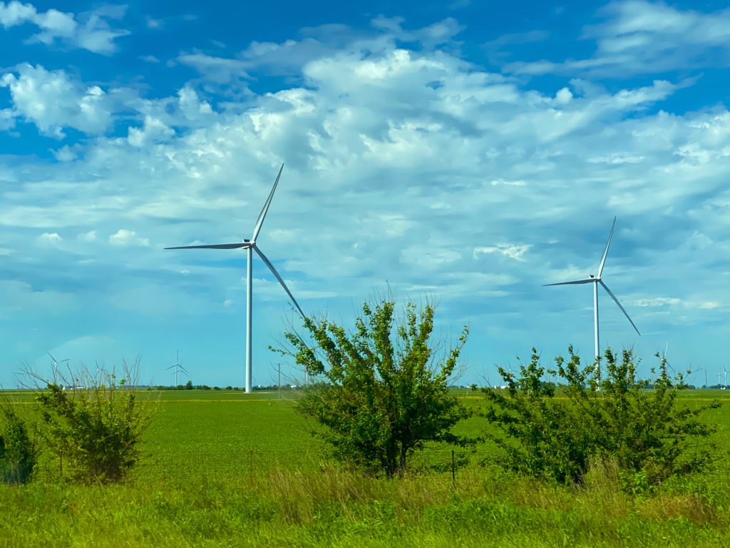 A wind turbine in a large field