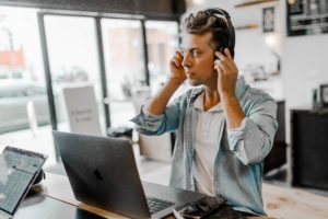 Cognitive technology includes natural language processing. An example of this is a man putting on a headset to listen to his assistive screen reader