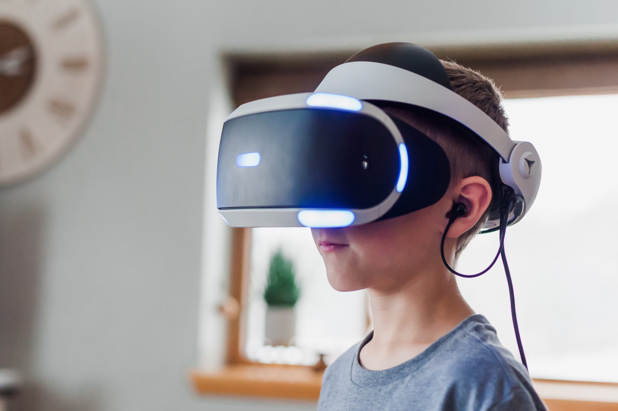 A boy with a VR headset on